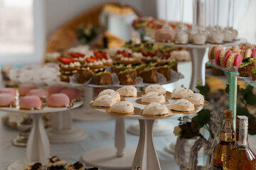Elegant Dessert Table Display with Assorted Pastries and Sweets