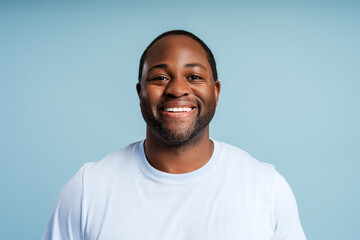 Fototapeta premium Smiling African American man posing at camera