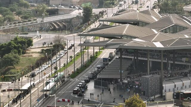 sunny day barcelona city center famous market exterior traffic street crossroad aerial panorama 4k spain