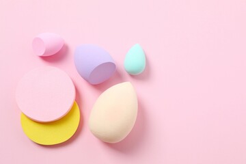 Beauty blender on a color background. Bright sponges for make-up cosmetics. Make-up products. Beauty concept