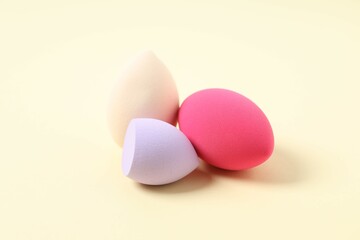 Beauty blender on a color background. Bright sponges for make-up cosmetics. Make-up products. Beauty concept