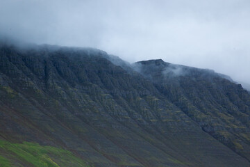 Iceland mountains with low clouds,