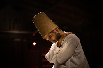 Dancing image of Sufi whirling dervish
