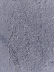 Old grey cement wall texture. Destroyed concrete surface. Grunge background. 