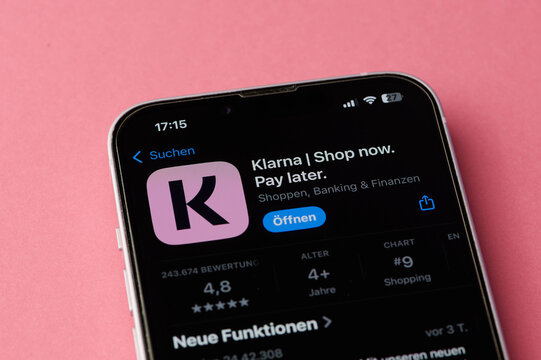 Mainz, Germany - October 24, 2024: Klarna app icon on a smartphone screen in Germany on pink background