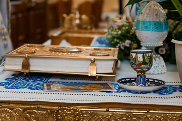 Ornate Decorative Table Setting Featuring an Elaborate Book and Handcrafted Ceramics