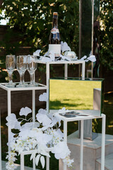 Elegant Celebration Display with Champagne and Floral Accents