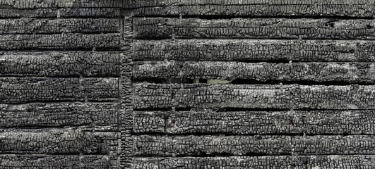 A fragment of a burnt house from a fire