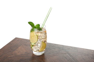 Glass of tasty refreshing drink and straw on wooden table against white background