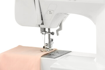 Sewing machine with cloth isolated on white