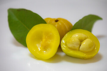 Ripe edible wild fruit from the Brazilian cerrado biome, fruit known as cagaita (Stenocalyx dysentericus) of the Magnoliopsida class and the Myrtaceae family.