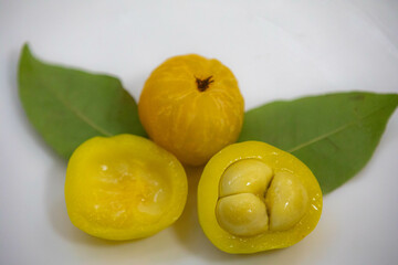 Ripe edible wild fruit from the Brazilian cerrado biome, fruit known as cagaita (Stenocalyx dysentericus) of the Magnoliopsida class and the Myrtaceae family.