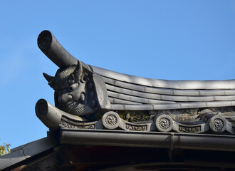 Roof detail. Japanese architecture. Blue sky. Kyoto city, Japan.