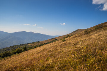 The Stunning and Scenic Mountain Ridge Beneath a Clear Blue Sky and Endless Horizons