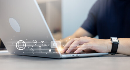 close up man hand type on laptop to browse website by use internet peering with virtual interface...