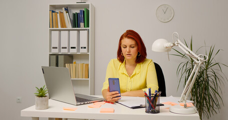 Business woman having zoom conference with the team sharing new ideas. Woman freelancer having a video call wih the employees.