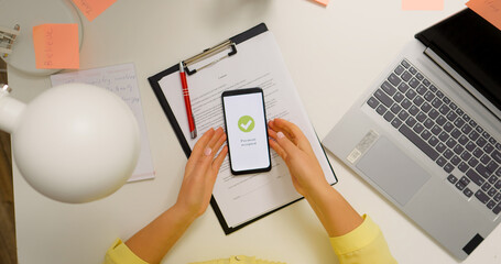 Top view woman working from home paying online from phone. Happy costumer accepted payment online...