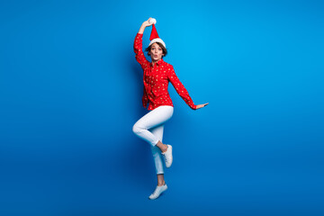 Full body portrait of nice young girl hold pompom xmas new year holiday isolated on blue color background