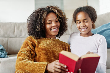 child mother home woman family girl daughter book reading education read two bonding parent kid...