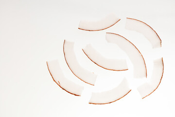 Pile of dehydrated coconut flakes with sugar - Cocos nucifera.