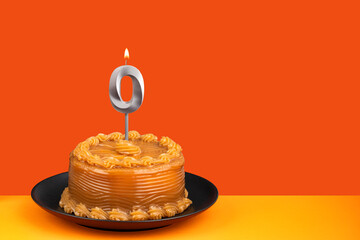 Birthday candle number 0 - Cake with dulce de leche frosting.