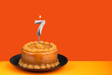 Birthday cake with dulce de leche frosting - Candle number 7