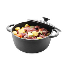 Cooking stew. Uncooked meat and vegetables in pot isolated on white