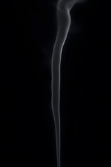 Elegant swirl of white smoke against a dark background