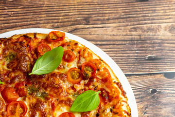 Vegetarian pizza on wooden background