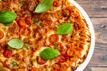Vegetarian pizza on wooden background