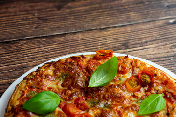 Vegetarian pizza on wooden background