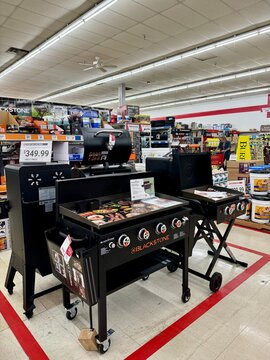 The grill Aisle of a Tractor Supply store in Mount Dora, Florida USA.