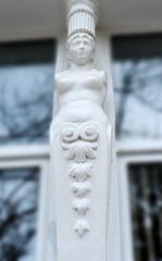 Caryatid  on wondow of turn of 20th century building in Chisinau, Moldova