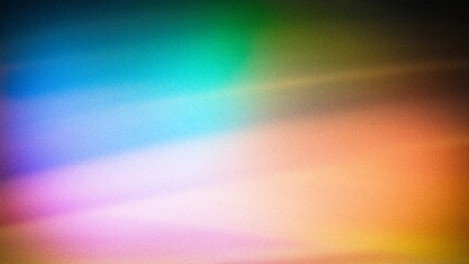 A vibrant grainy gradient with a spectrum of green, blue, yellow, and orange hues, offering a smooth and colorful background for creative and digital designs