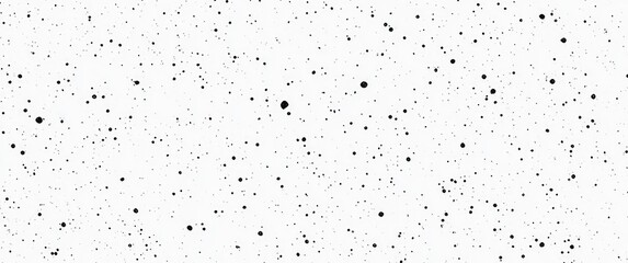 A pattern of black dots on a white background, resembling a starry sky or speckled surface.