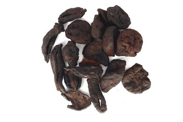 The photo shows a close-up of dried Garcinia xanthochymus (asam kandis) peels. These peels are commonly used in Southeast Asian cuisine, particularly in Indonesian cooking.
