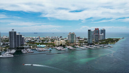 Obraz premium Aerial view of Miami Beach, Florida, United States. Drone shot of Miami on sunny day. Miami Beach, wonderful aerial view of buildings. Panorama view of Miami Beach, South Beach, USA.