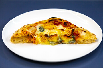 Traditional rustic pizza made with four cheeses, garlic and oil and pear with gorgonzola