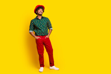 Full body portrait of nice elegant young man look empty space wear shirt isolated on yellow color...