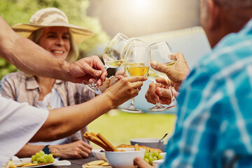 Outside, hands and people with wine glass for toast on tasting, date and bonding in France. Park, friends and smile with alcohol for cheers on celebration, party and relax on break with love and food
