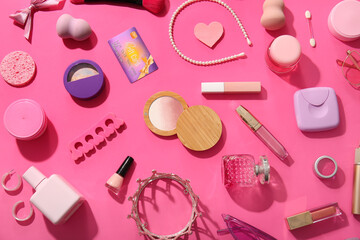 Composition with different decorative cosmetics, accessories and gift card on pink background