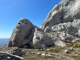 Rocky ridge of Tulove grede or karst mountain peak of Tulovice - Velebit Nature Park, Croatia (Stjenoviti greben Tulove grede ili krški planinski vrh Tulovice - Park prirode Velebit, Hrvatska)