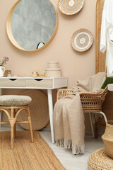 Stylish dressing table with mirror in room