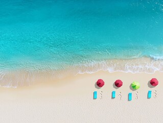 Naklejka premium Aerial view of vibrant beach umbrellas on golden sand by the turquoise ocean, creating a relaxing summer atmosphere.