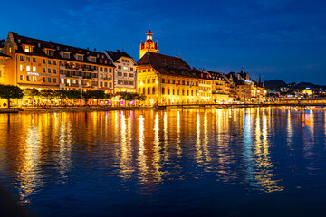 Lucern city with touristic Chapel Bridge. Lucerne city view. Canton of Lucerne. Lucern Switzerland. Sunrise in historic city center of Lucerne with famous Chapel Bridge and lake Lucerne.