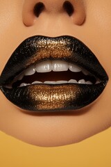 Fototapeta premium CLOSEUP of black gloss lips with metallic copper tongue and silver teeth on golden background with space for text.