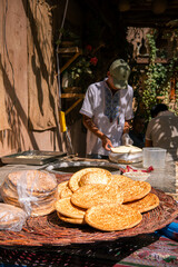 A man making some traditional Silk road bread in Kashgar, Xinjiang Uighur region, China