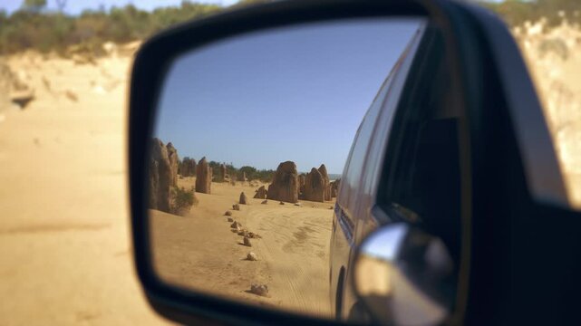The Pinnacles Desert, Western Australia. Pinnacle in Nambung National Parkdesert. Thousands of limestone pillars in the Pinnacles Desert. view from a van during a roadtrip