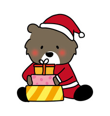 クリスマスプレゼントを積み上げているクマ