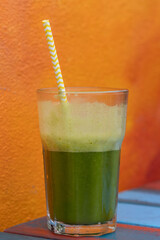 green smoothie drink isolated against a backdrop